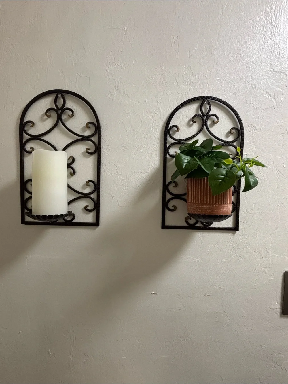 Two vintage iron scroll wall sconce candle holders